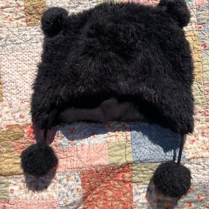 Large fuzzy faux fur black hat with ears